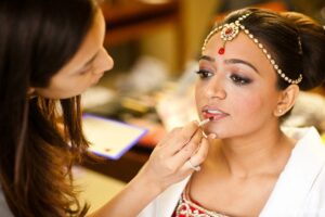 indian wedding bride getting ready makeup